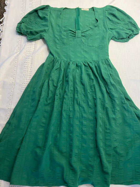 The Kelly green dress